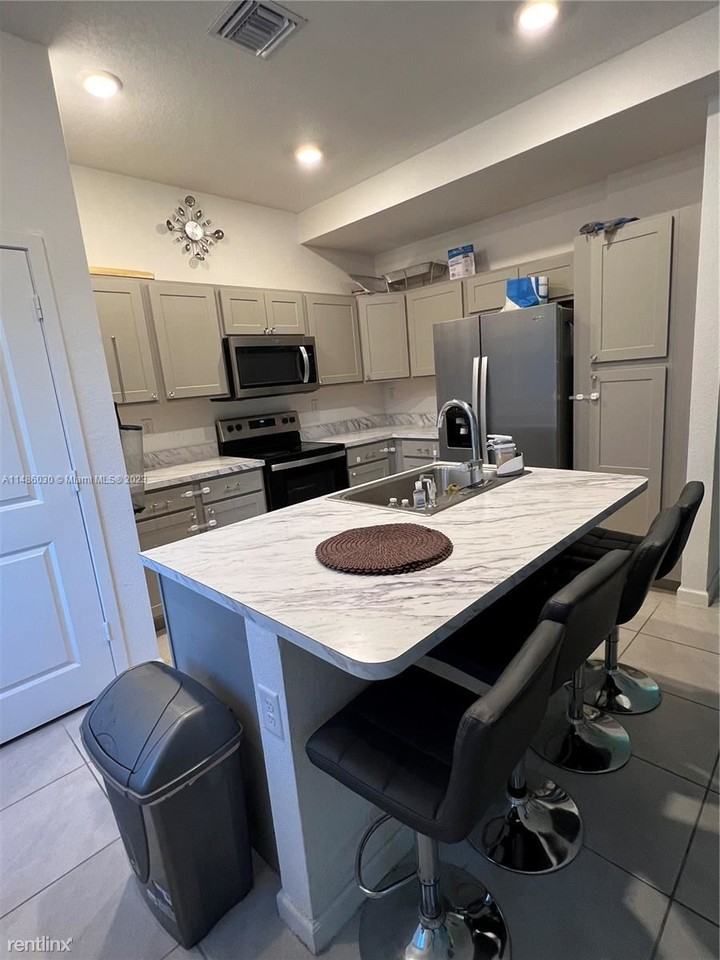 1141 Nw 208th Ter - Photo 2 of 18