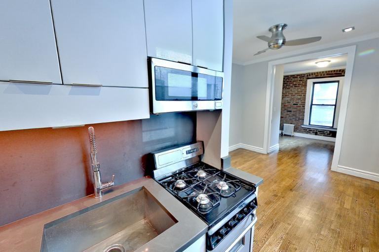 E 13th St #2F - Photo 3 of 5