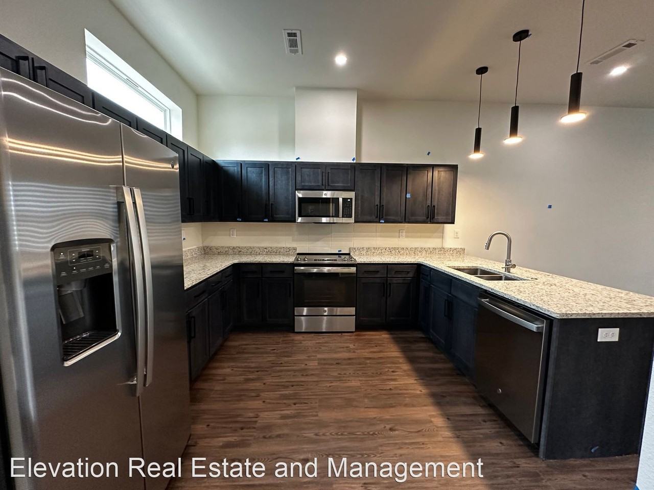 **Tour Availability Coming Soon**Brand New Modern Living Townhomes-- Pre-leasing Now-- Limited Availability - Photo 2 of 23