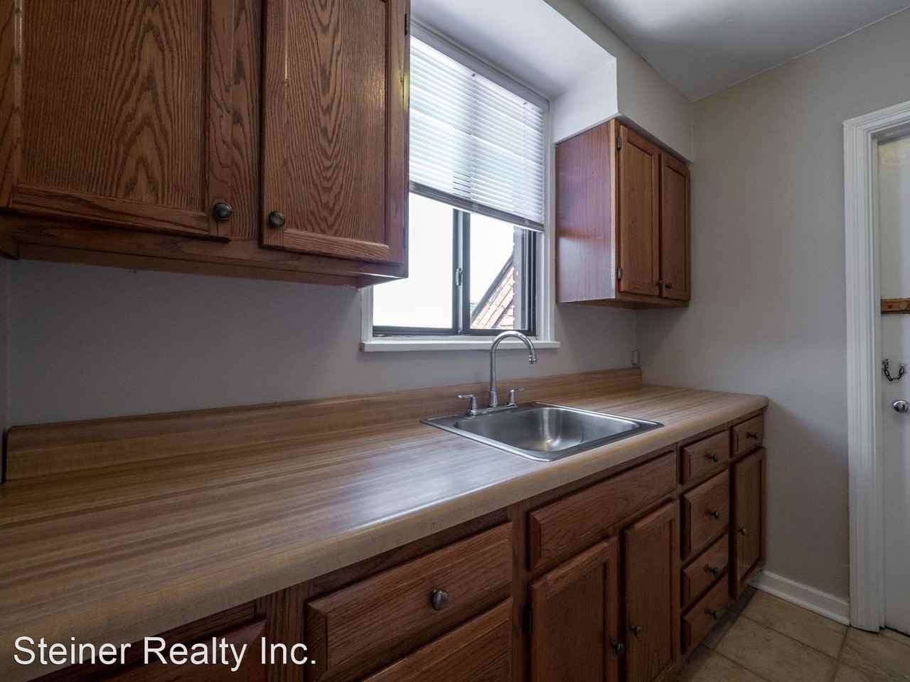 Tudor Court Apartments - Photo 3 of 8