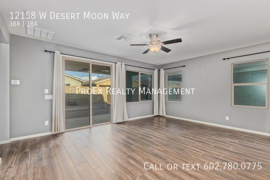 12158 W Desert Moon Way - Photo 5 of 29