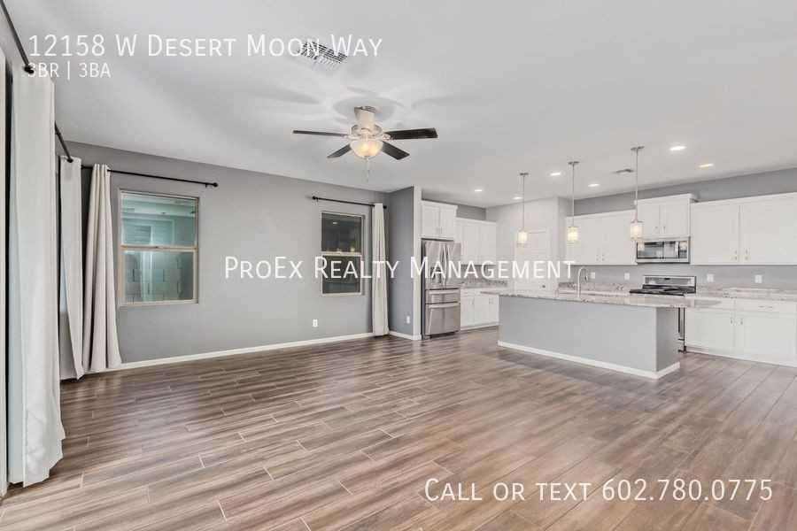 12158 W Desert Moon Way - Photo 6 of 29