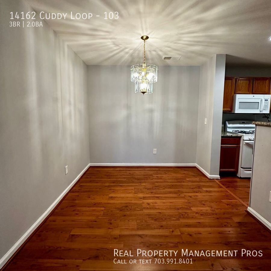 14162 Cuddy Loop #103 - Photo 5 of 17