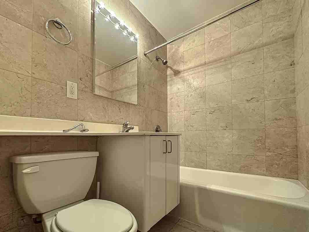 242 E 49th St #2 - Photo 3 of 7