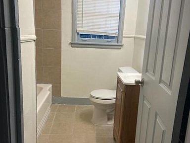 3128 Faxon Ave - Photo 3 of 4