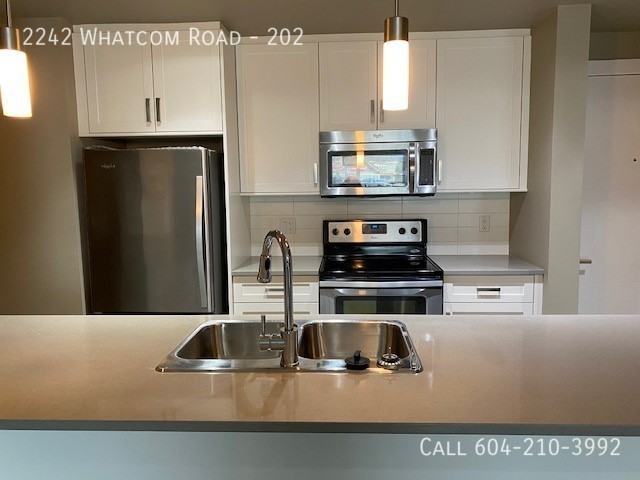 2242 Whatcom Rd #202 - Photo 2 of 17