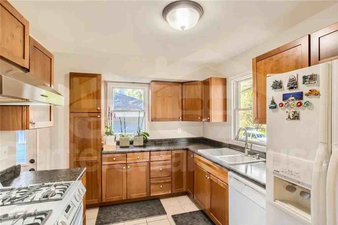 7729 Plymouth Ave N - Photo 2 of 24