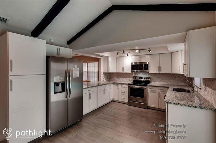 2474 Moore Haven Dr E - Photo 2 of 16