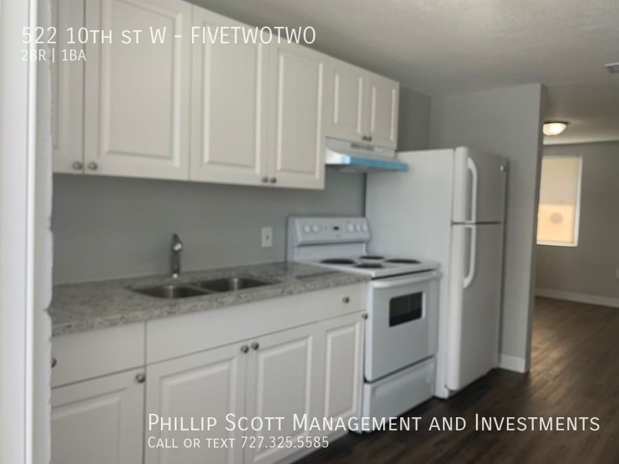 522 10th St W - Photo 2 of 9