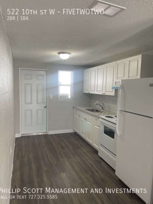 522 10th St W - Photo 3 of 9