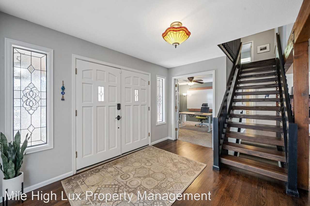 7566 S Prescott St - Photo 2 of 40