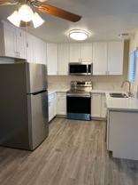 Uptown Villas | Spacious Apartments with parking in Grant Hill! - Photo 1 of 1