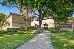 Courtyard Townhome Apartments - Photo 1 of 1