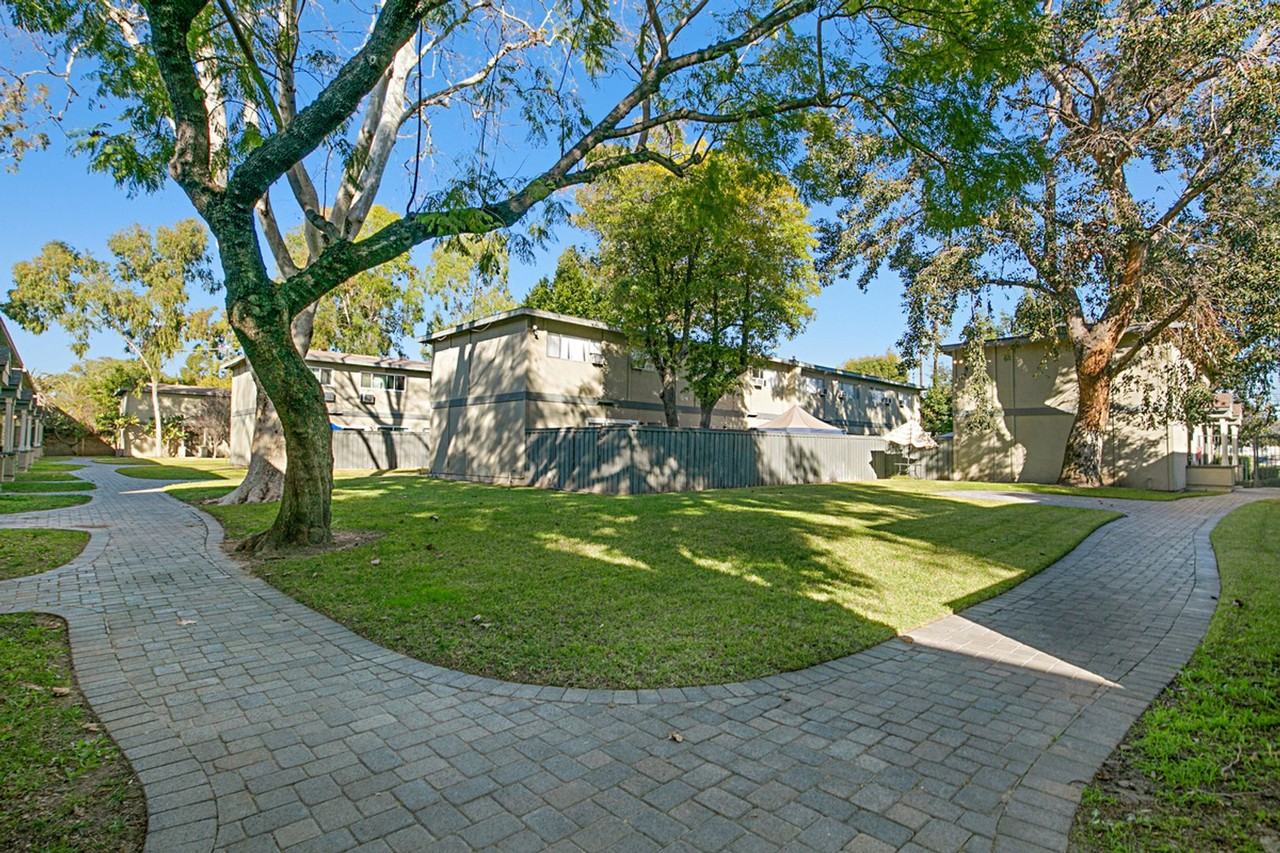 Courtyard Townhome Apartments - Photo 2 of 26
