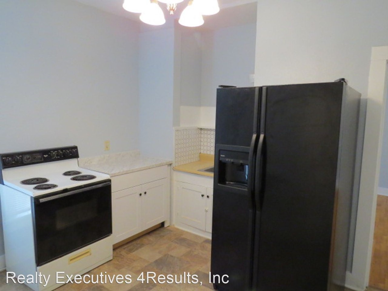 1102 N Elm St - Photo 3 of 10