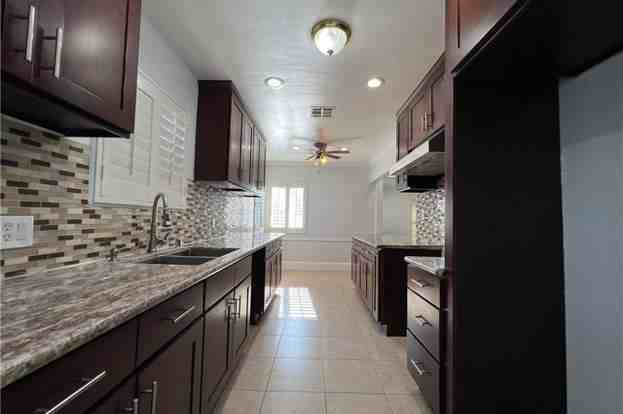 6726 Denmead St - Photo 3 of 15