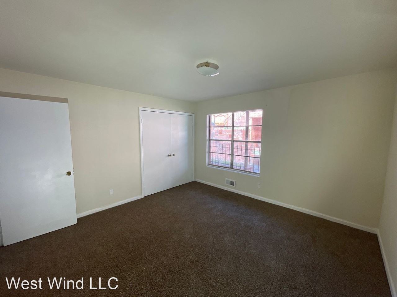 709-713  8th Ave W West Wind LLC - Photo 2 of 4