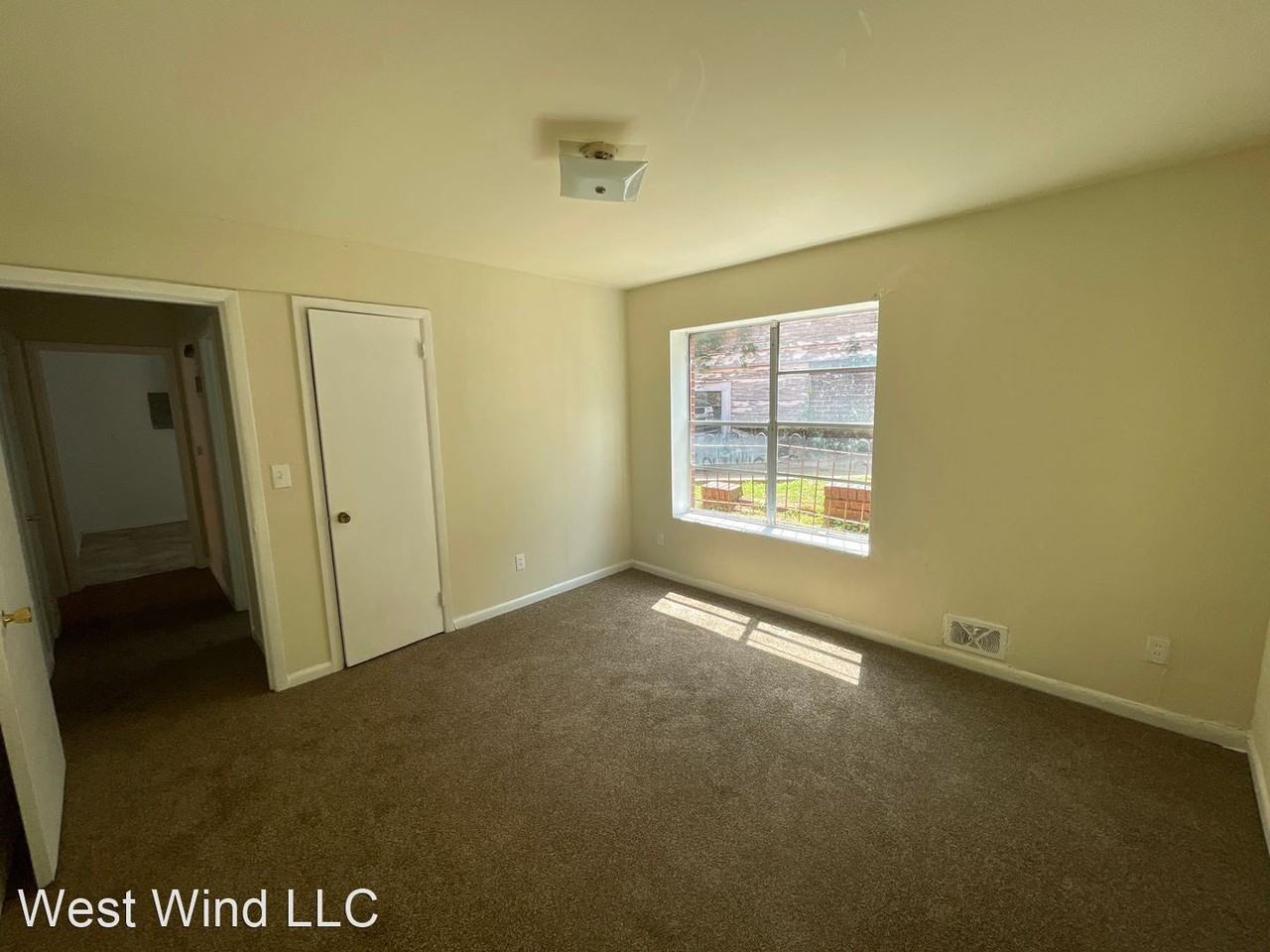 709-713  8th Ave W West Wind LLC - Photo 3 of 4