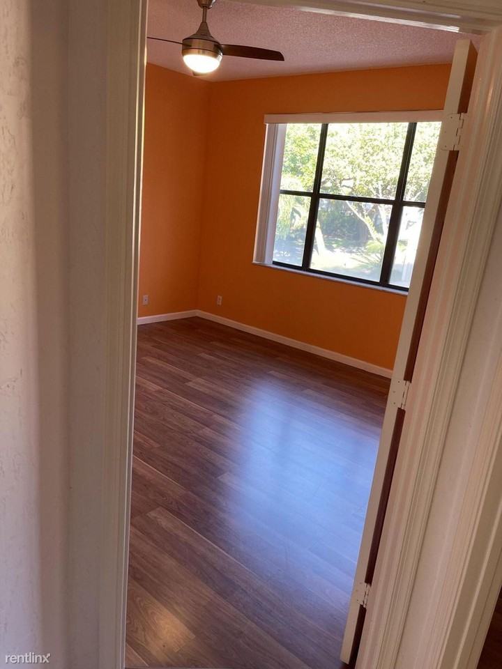 5790 Coach House Cir #G - Photo 3 of 14