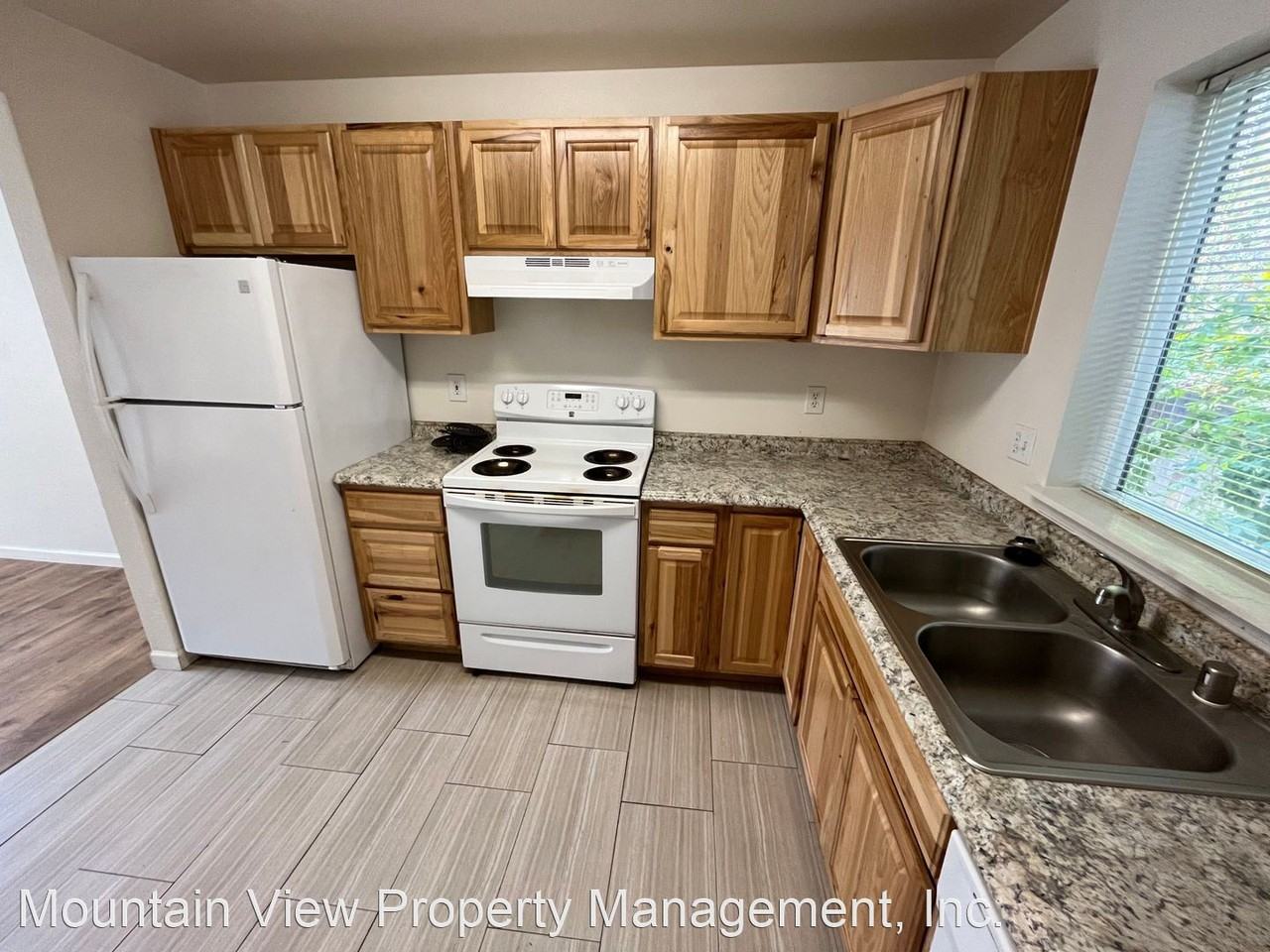 1453 NE Tucson Way - Photo 3 of 13