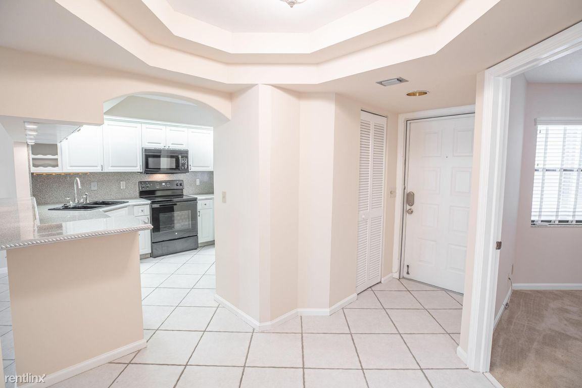 123 Bay Colony Dr N - Photo 2 of 16