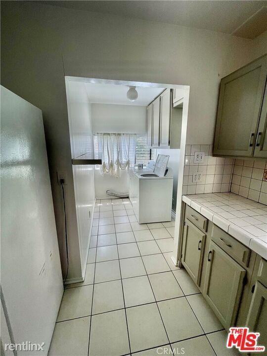 1145 N Genesee Ave - Photo 3 of 8