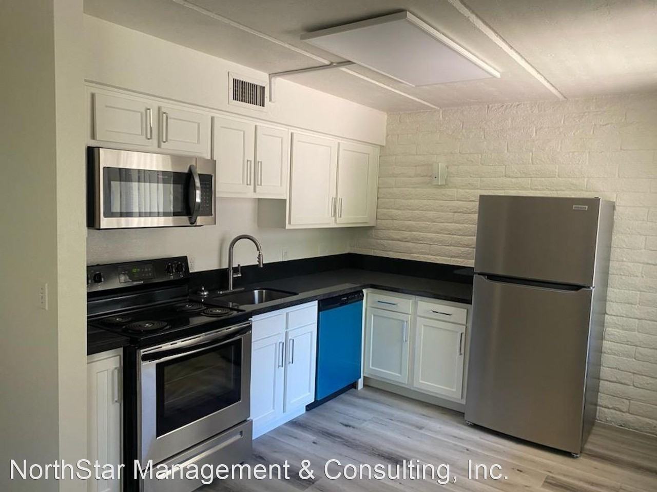 1250 E 10TH ST - Photo 2 of 9