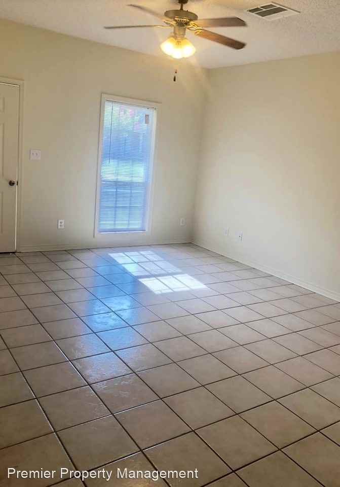 Duplex with covered carport - Photo 3 of 9