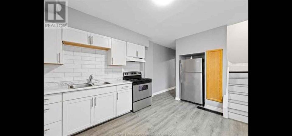 Edison St & St Antoine St - Photo 2 of 8