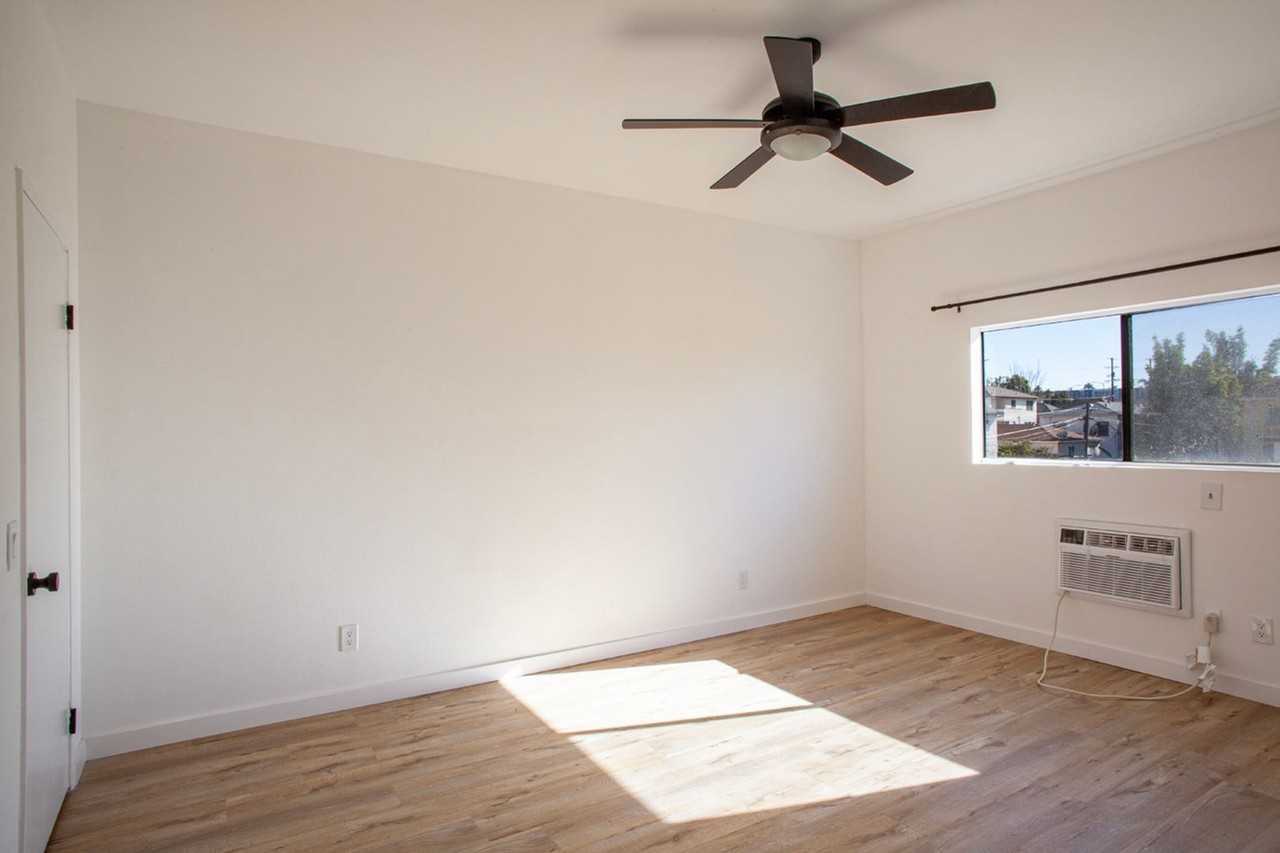 Renovated Townhome Apartments in Prime Virgil Village Location; SPECIAL - FREE RENT - Photo 3 of 5