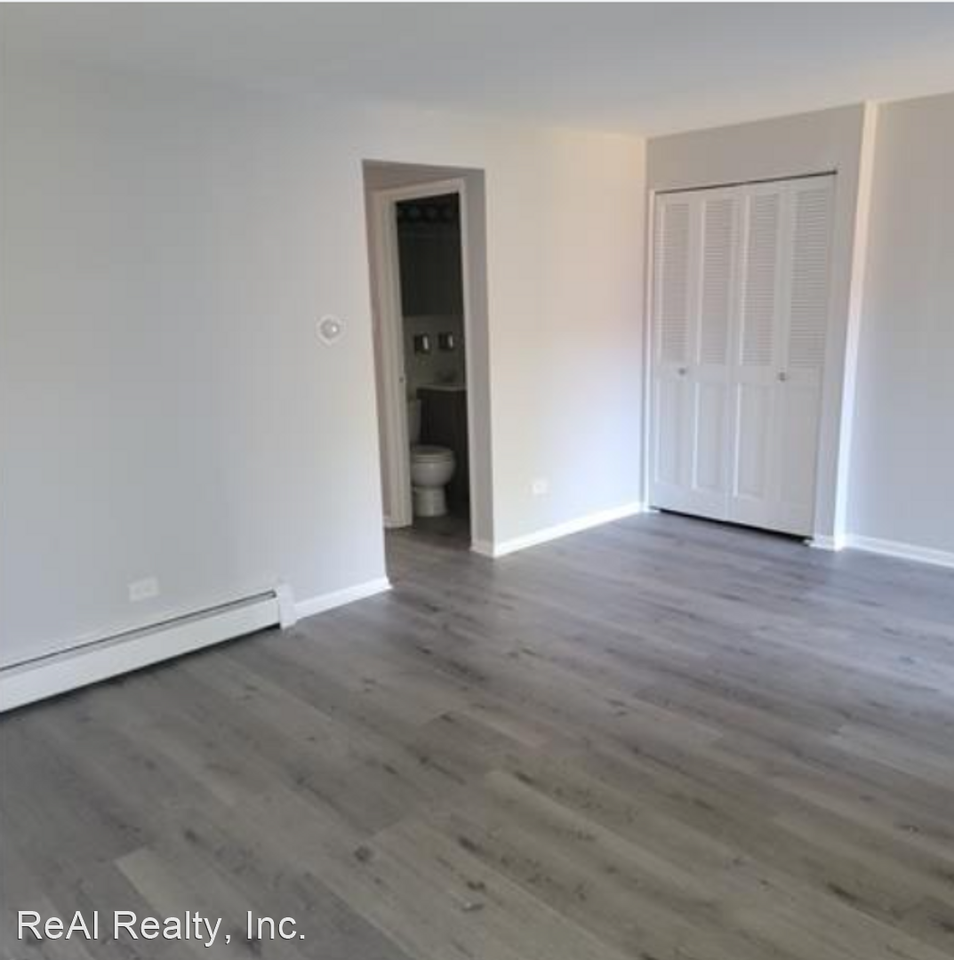 445 - 59 E. 107th Street  10700 S. Eberhart Ave. - Photo 2 of 5