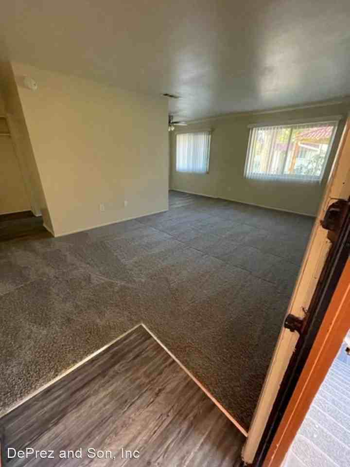 6096 RIVERSIDE AVENUE Claystone Del Plaza Apartments in Hawarden Hills