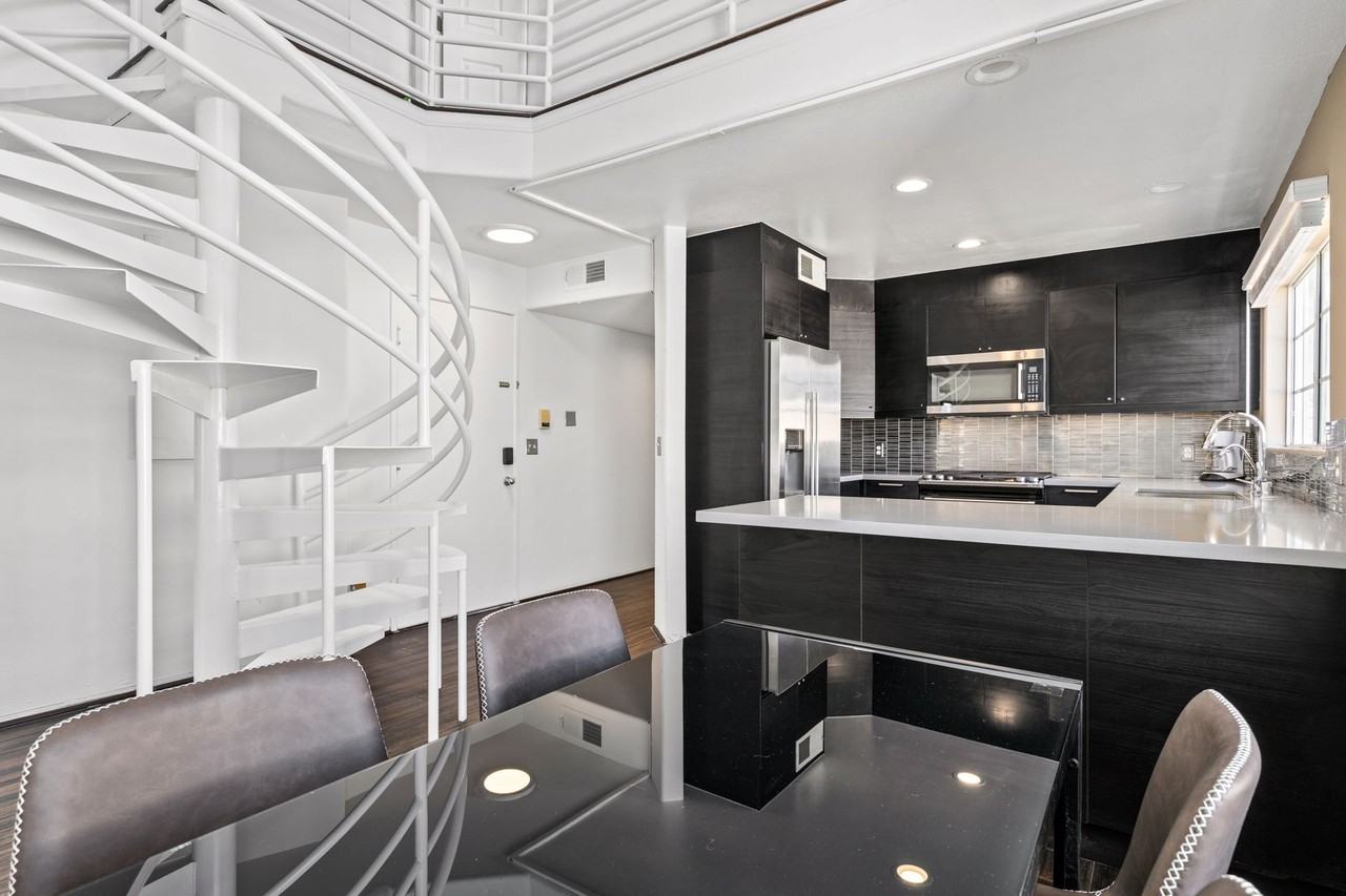 A 7 Bedroom, 2 Bathroom with a dining room and fully functional kitchen at 10777 Ashton Ave. - Photo 2 of 50