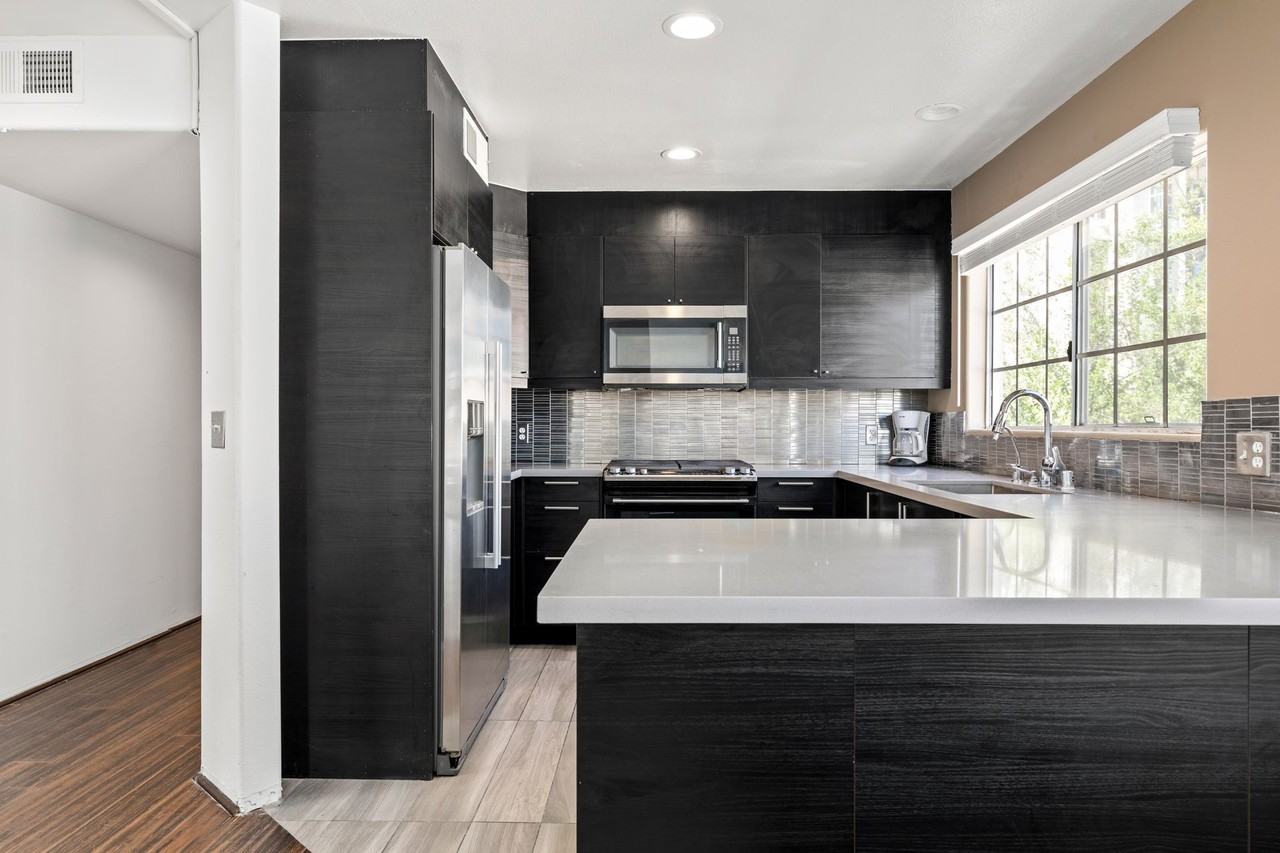 A 7 Bedroom, 2 Bathroom with a dining room and fully functional kitchen at 10777 Ashton Ave. - Photo 4 of 50