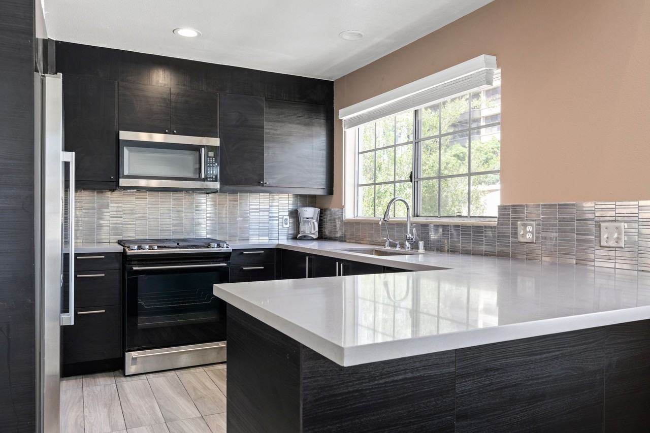 A 7 Bedroom, 2 Bathroom with a dining room and fully functional kitchen at 10777 Ashton Ave. - Photo 6 of 50