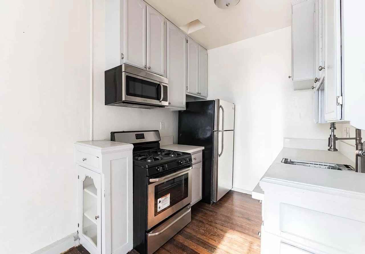The Ashby | Historic and Renovated Apartments with Exposed Brick - Photo 5 of 9