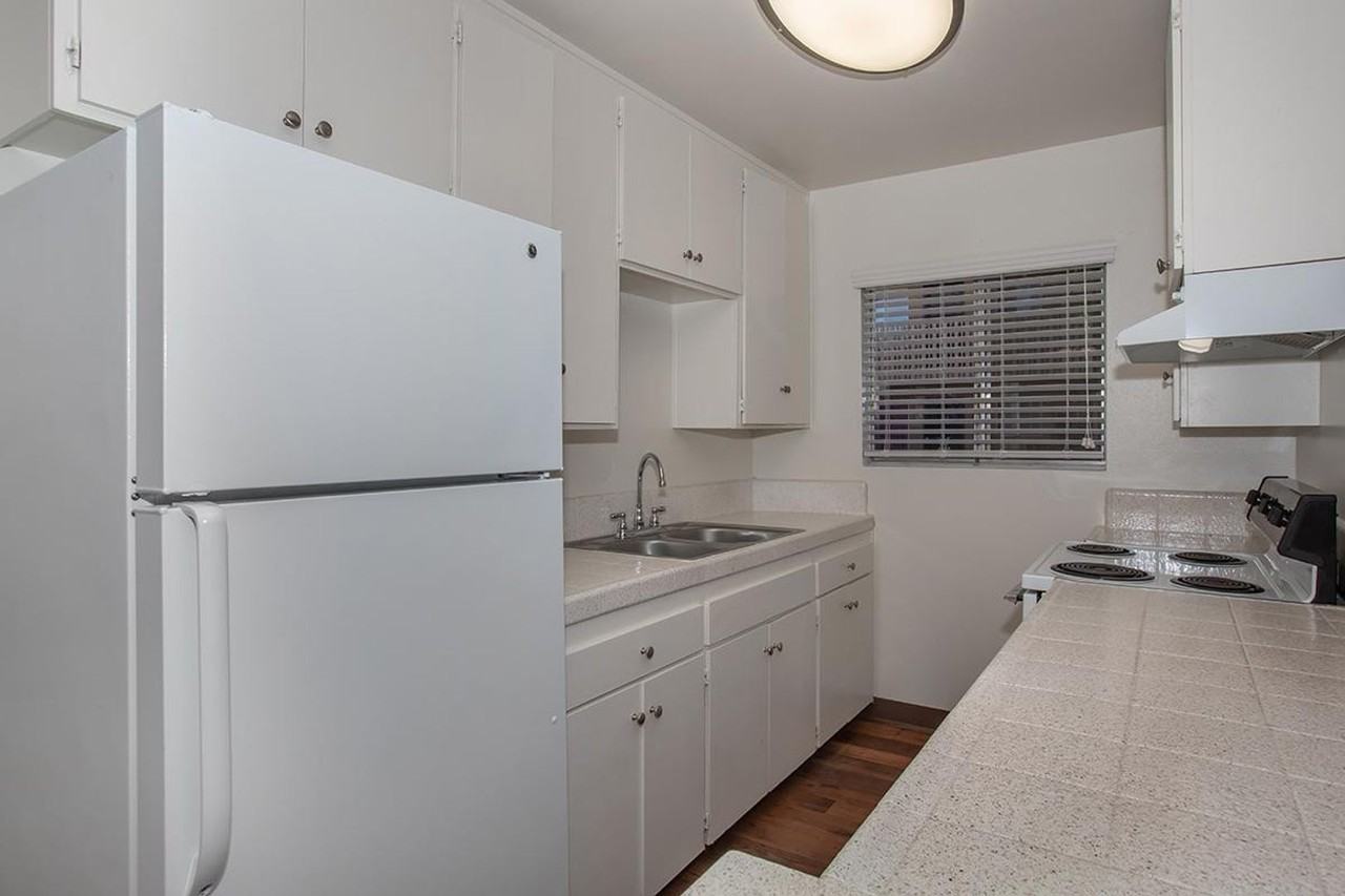 Village Green Apartments - Photo 3 of 37