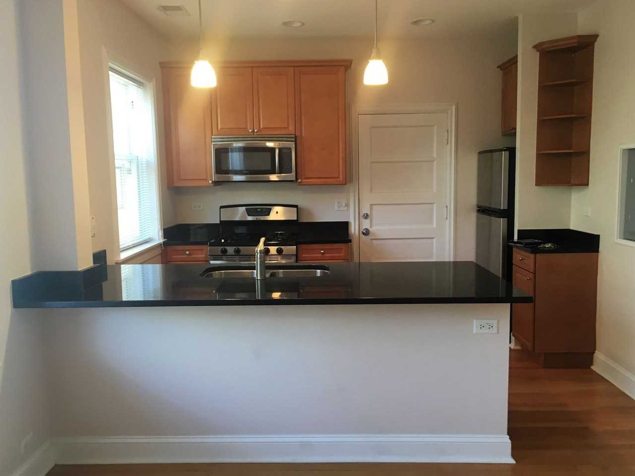 324 - *1238-40 Oak Building* - Photo 4 of 8