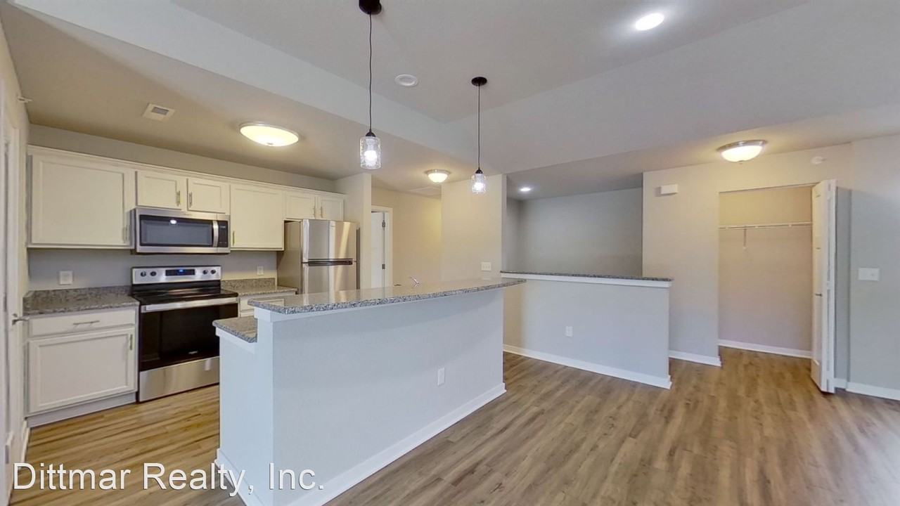 1902,1904,1906,1908,2002,2004,2006,2008 American Eagle Dr - Photo 3 of 27