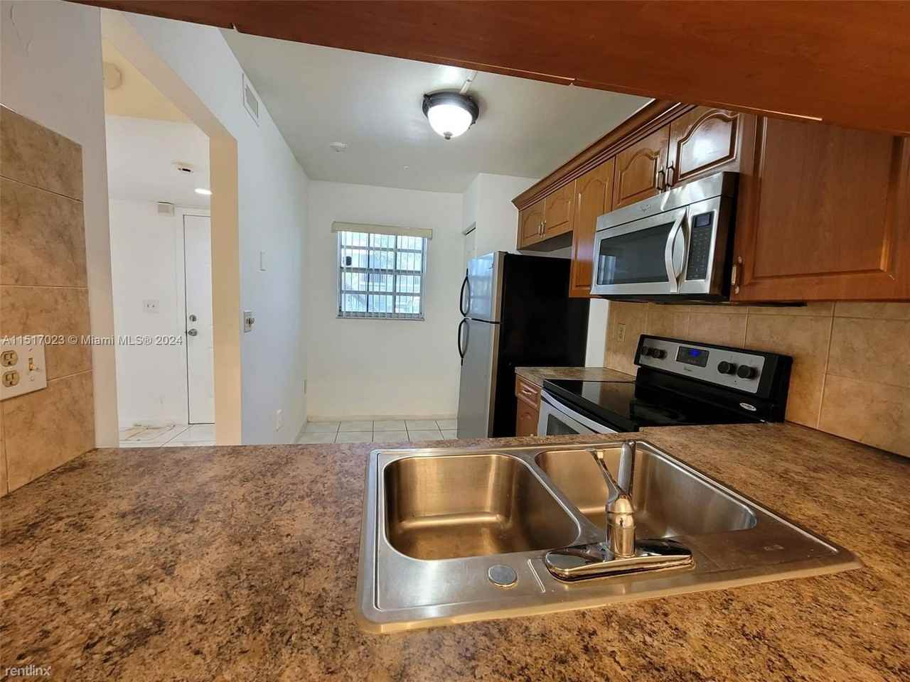 426 Ne 210th Circle Ter #106-2 - Photo 2 of 12