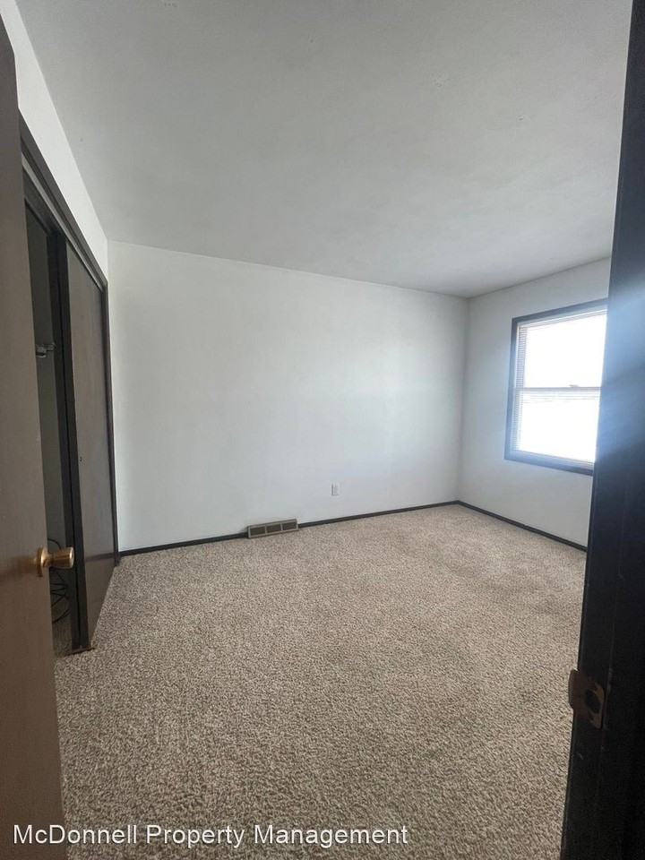 3367 Hillandale Rd. & 2931 W 34th St. - Photo 3 of 6