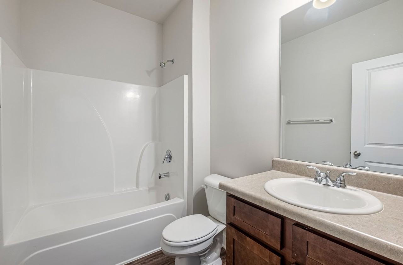 Bruce Wayne Apartments - Photo 2 of 13