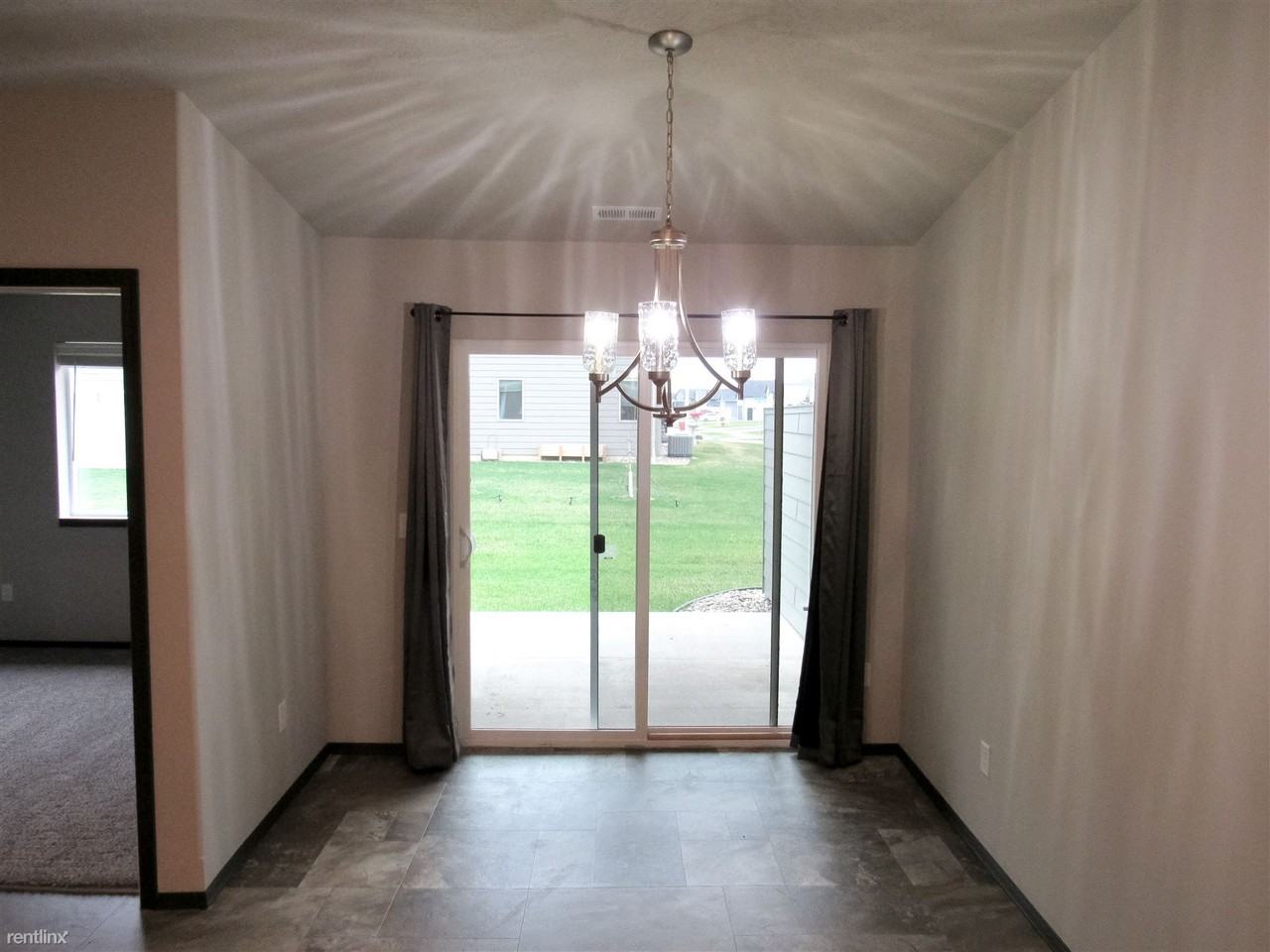 Greyhawk Townhomes - Photo 3 of 9