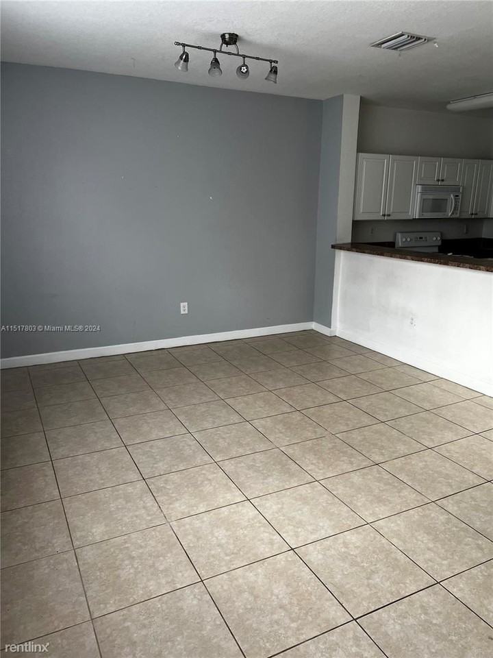 1490 Ne 33rd Ave #201-13 - Photo 2 of 10