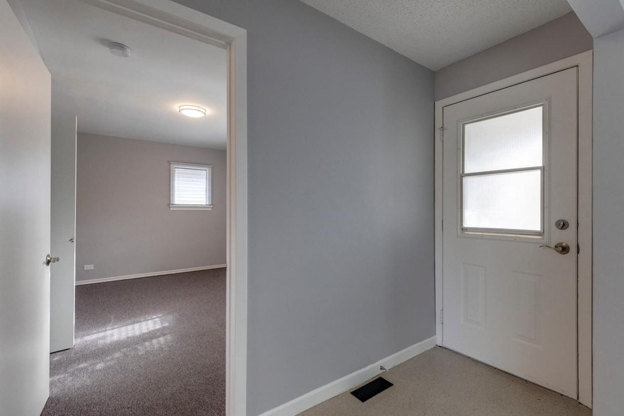 1014 Regal Crescent Northeast - Photo 2 of 19