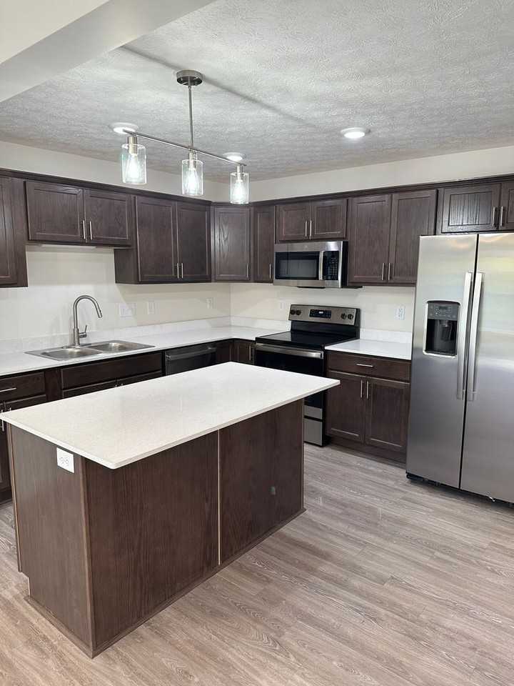 Creekwood Townhomes - Photo 2 of 22