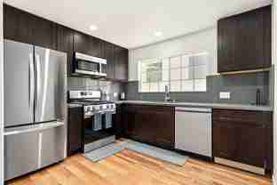 A 7 Bedroom, 2 Bathroom with a dining room and fully functional kitchen at 10777 Ashton Ave. - Photo 1 of 1