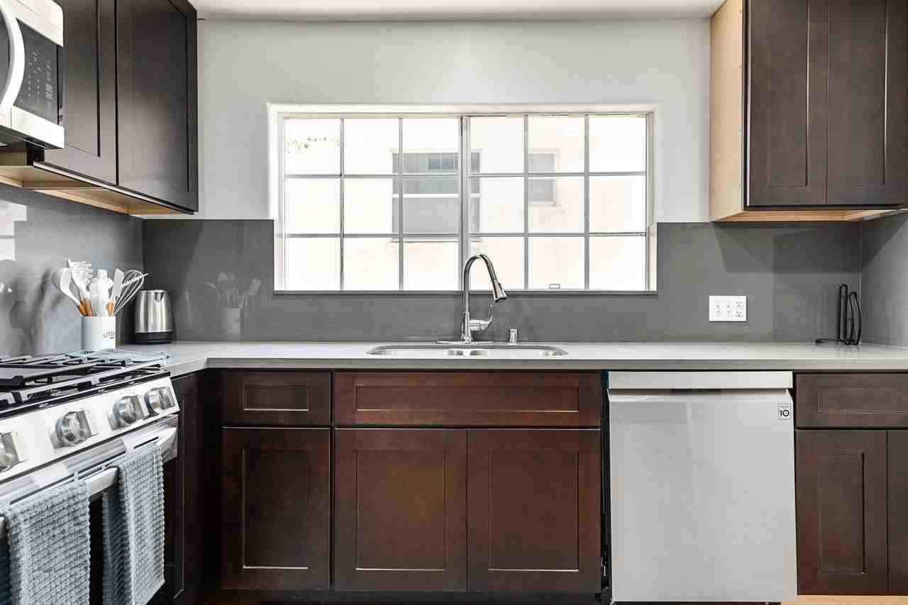 A 7 Bedroom, 2 Bathroom with a dining room and fully functional kitchen at 10777 Ashton Ave. - Photo 3 of 26