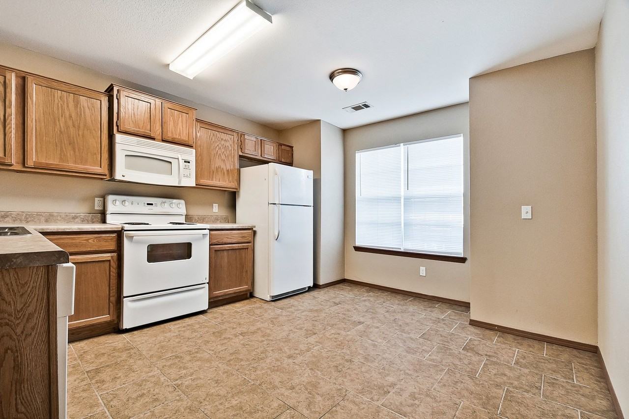 Stonegate Duplexes - Photo 3 of 14