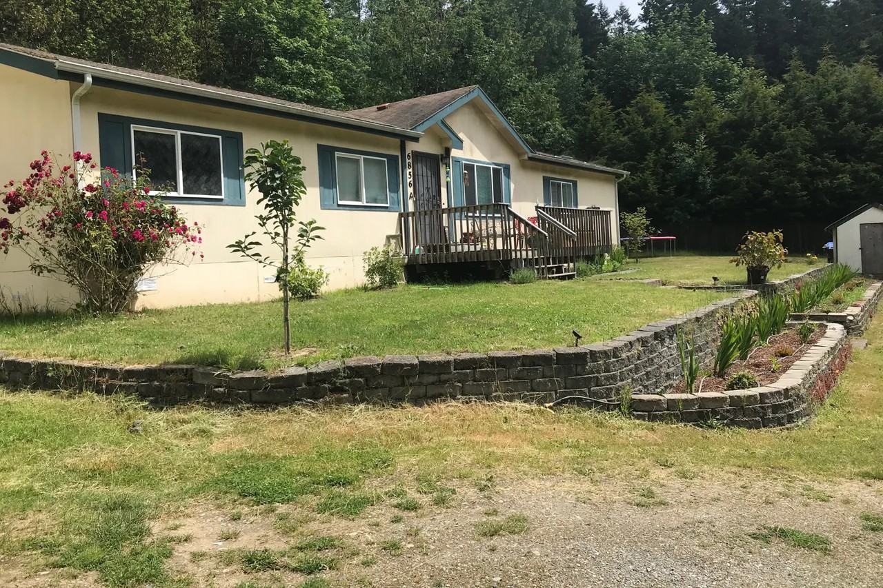 6856 Ne West Port Madison Rd - Photo 2 of 3